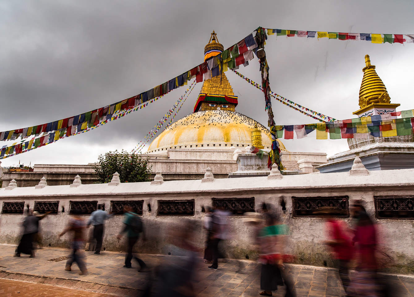 Buddhists circumnavigate the Boudhanath stupa in Kathmandu.