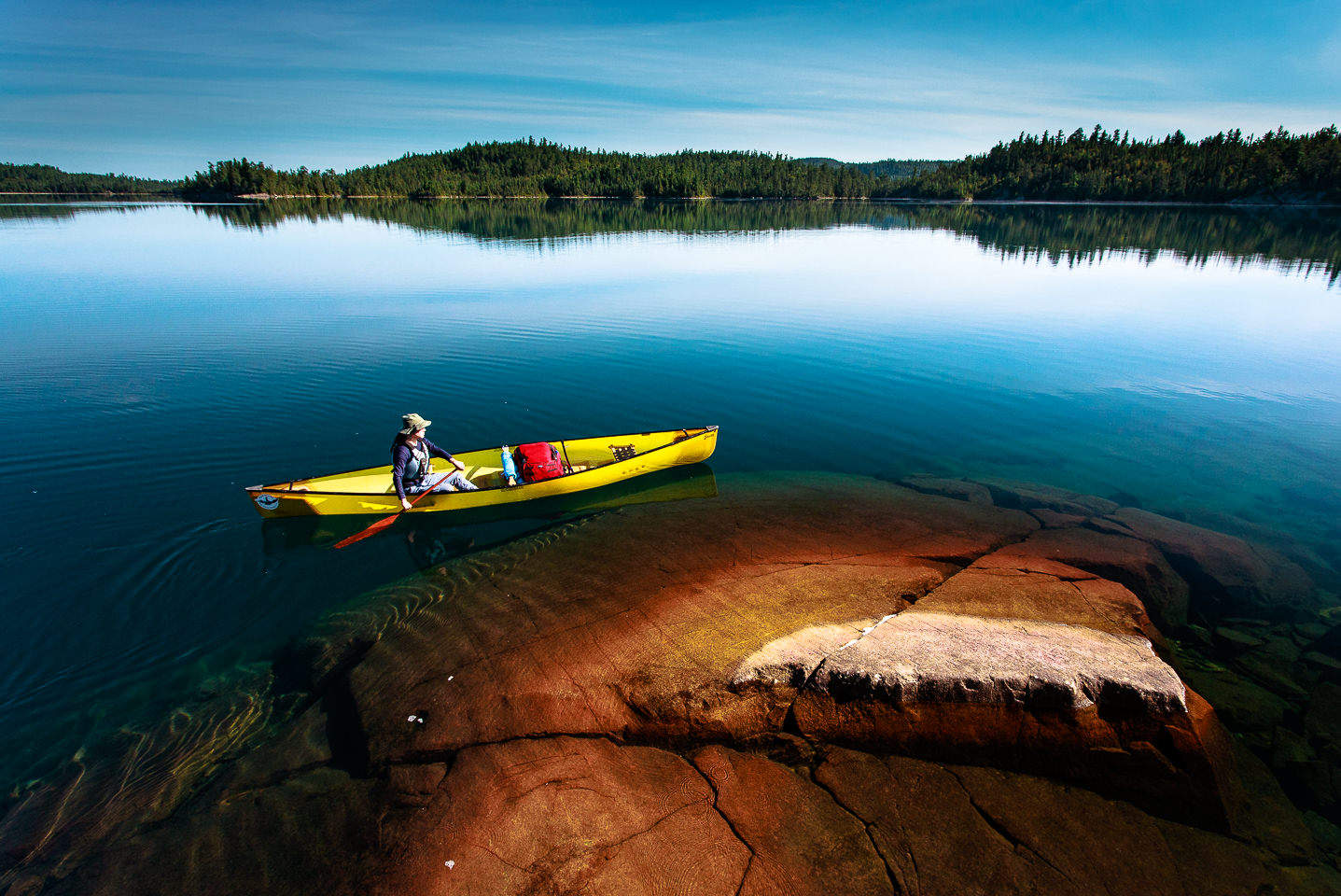 Solo canoeing in the heart of Temagami, Ontario.